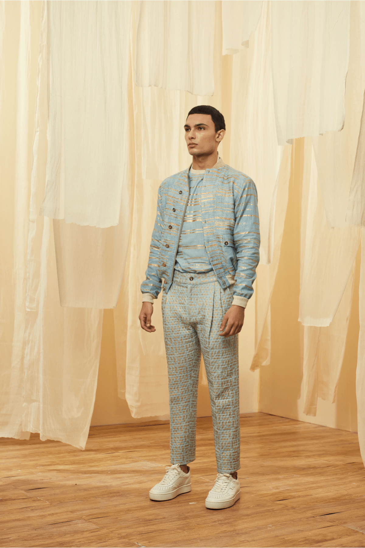 Blue Bomber Jacket with a Blue Poloneck and Blue Trousers - Kunal Anil Tanna