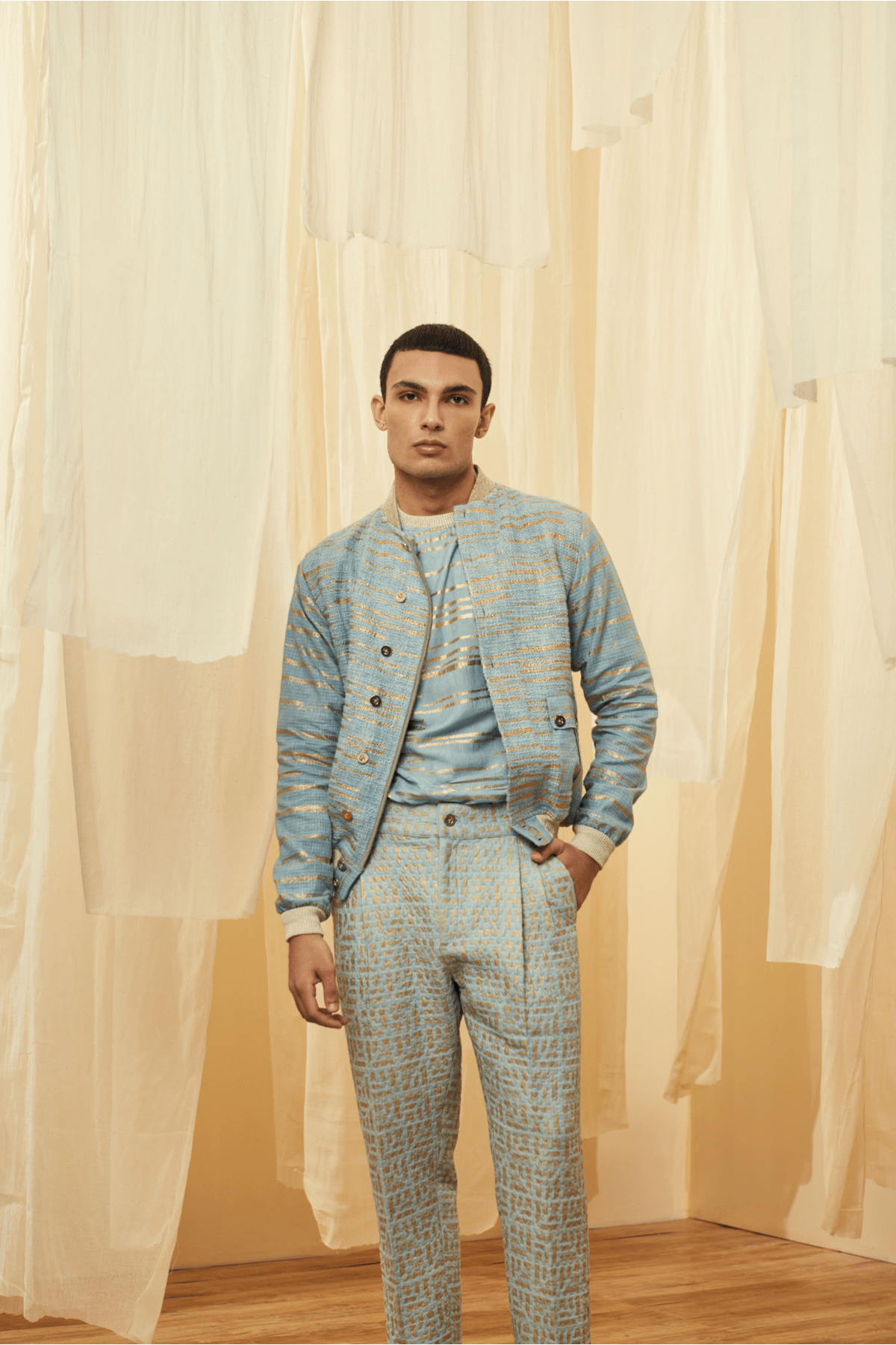 Blue Bomber Jacket with a Blue Poloneck and Blue Trousers - Kunal Anil Tanna