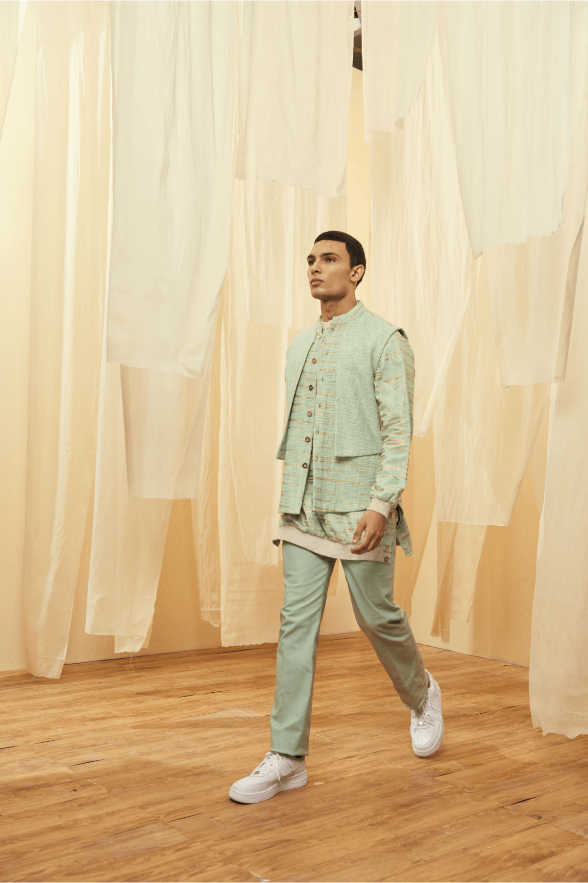 Green Mock-layered Bandi Jacket, Green Long Polo neck and Green Trousers - Kunal Anil Tanna