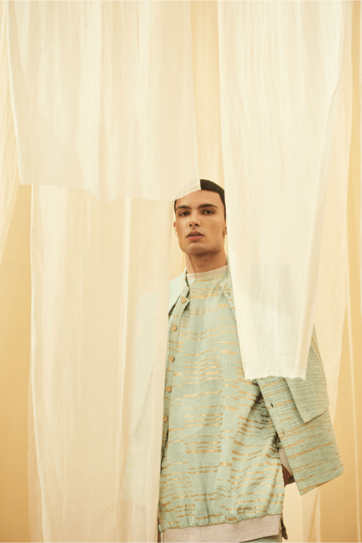 Green Mock-layered Bandi Jacket, Green Long Polo neck and Green Trousers - Kunal Anil Tanna