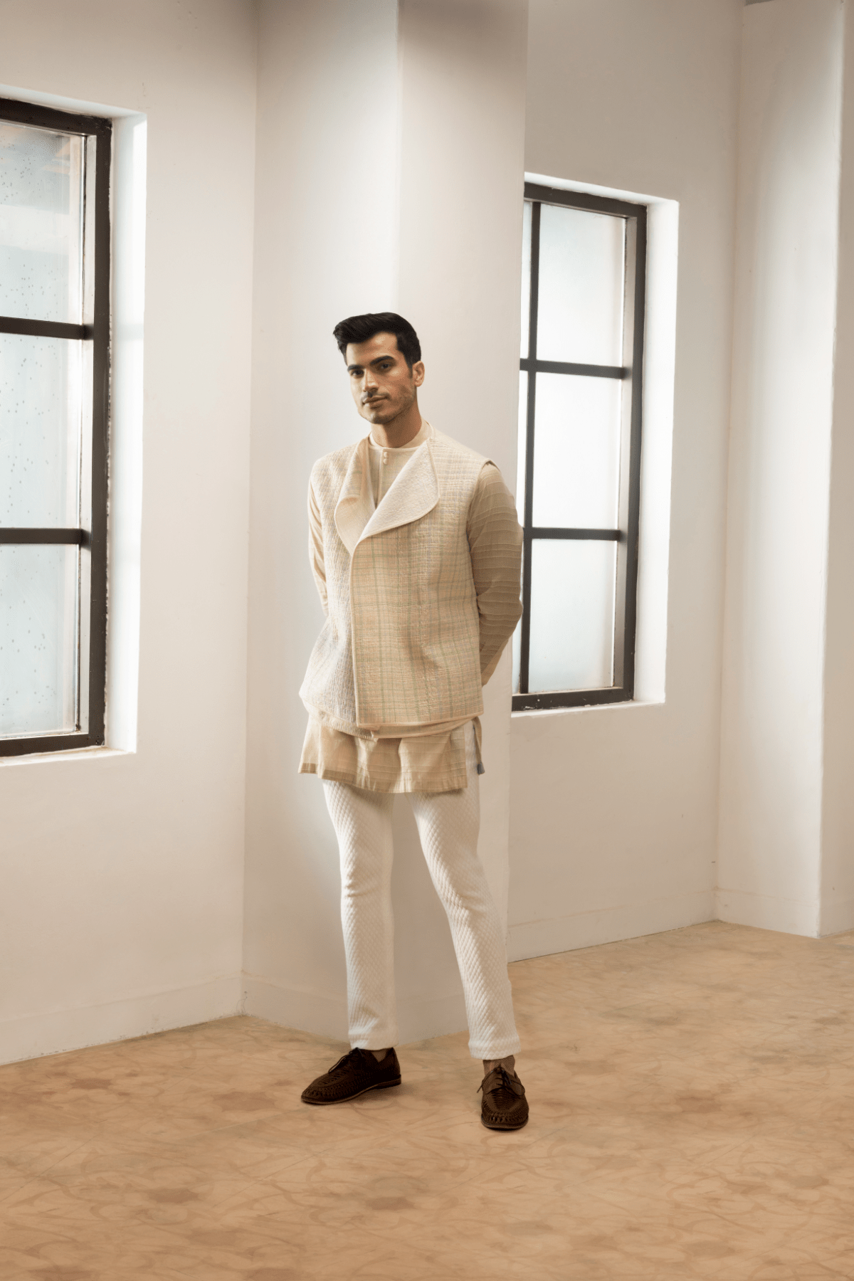 Ivory textured jacket with off white kurta and white pants. - Kunal Anil Tanna