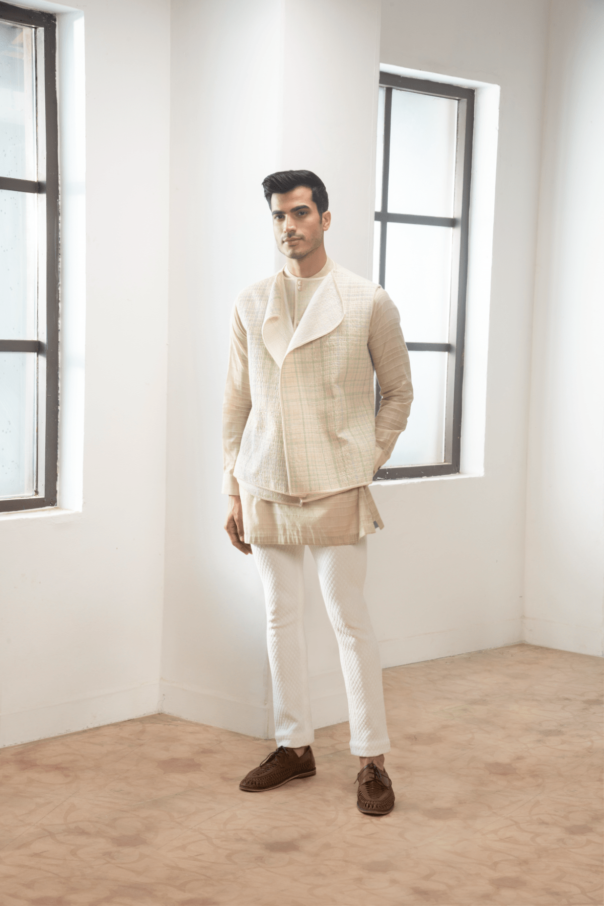 Ivory textured jacket with off white kurta and white pants. - Kunal Anil Tanna