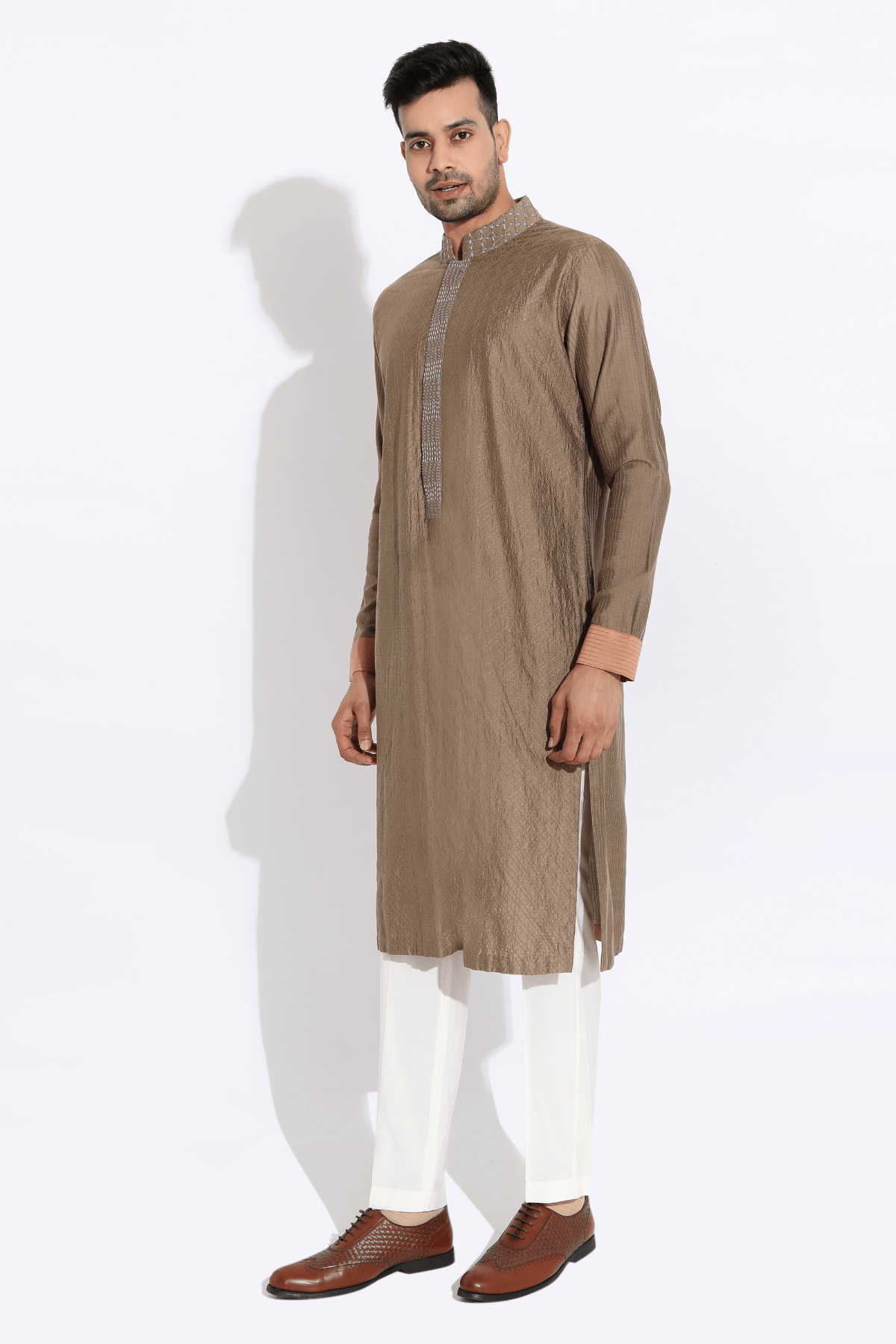 Beige textured kurta with salmon cuff and finish and pyjama - Kunal Anil Tanna
