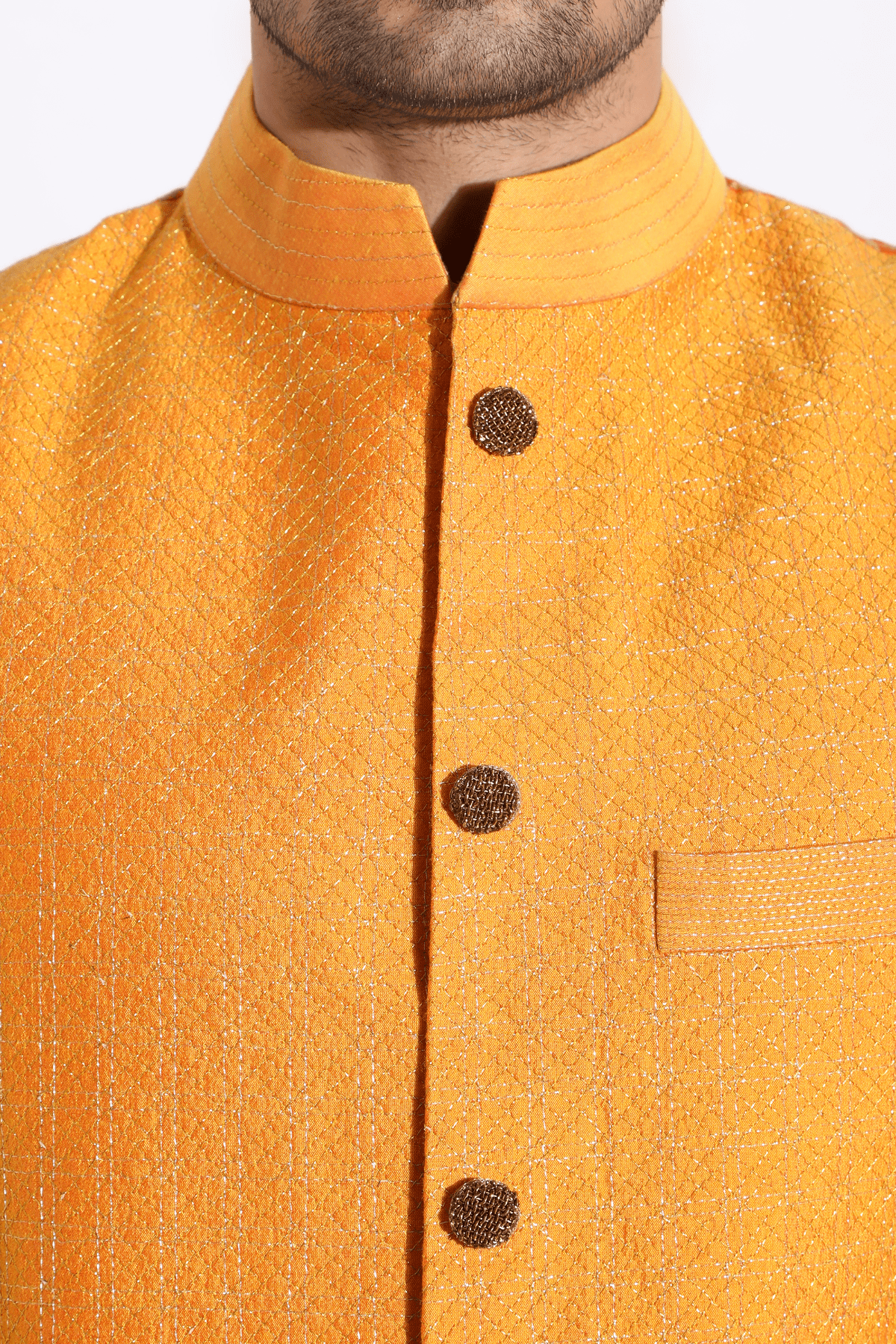 Orange textured bandi worn over orange kurta with aligarhi - Kunal Anil Tanna