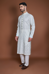 Off white blue and zari texture kurta set