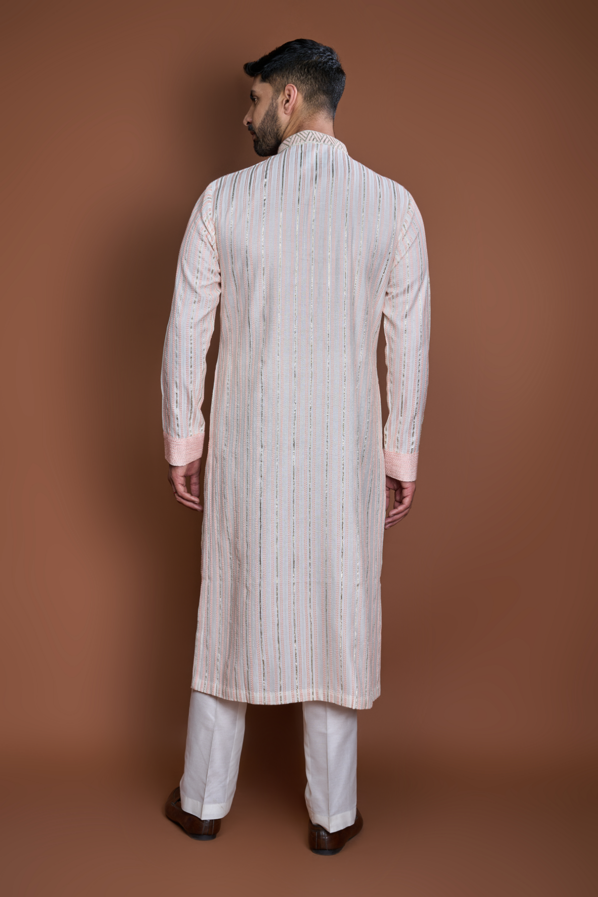 Off white peach zari texture kurta set
