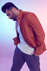 Arjun Kapoor In Rust trench style shirt jacket with flaps - Kunal Anil Tanna
