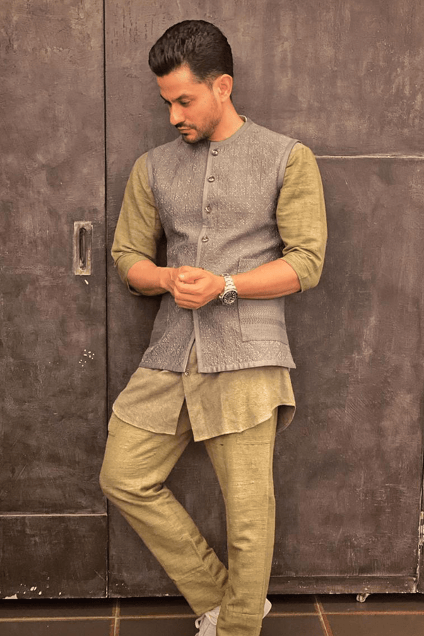 Kunal Khemu In Light grey bandi jacket with olive green rib tshirt and olive green trousers - Kunal Anil Tanna