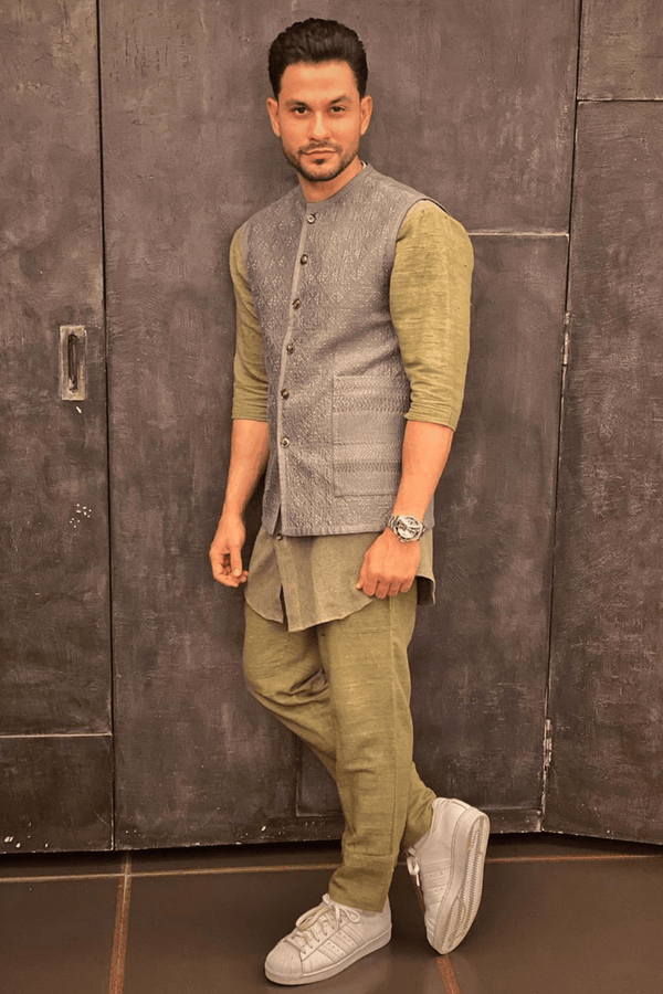 Kunal Khemu In Light grey bandi jacket with olive green rib tshirt and olive green trousers - Kunal Anil Tanna