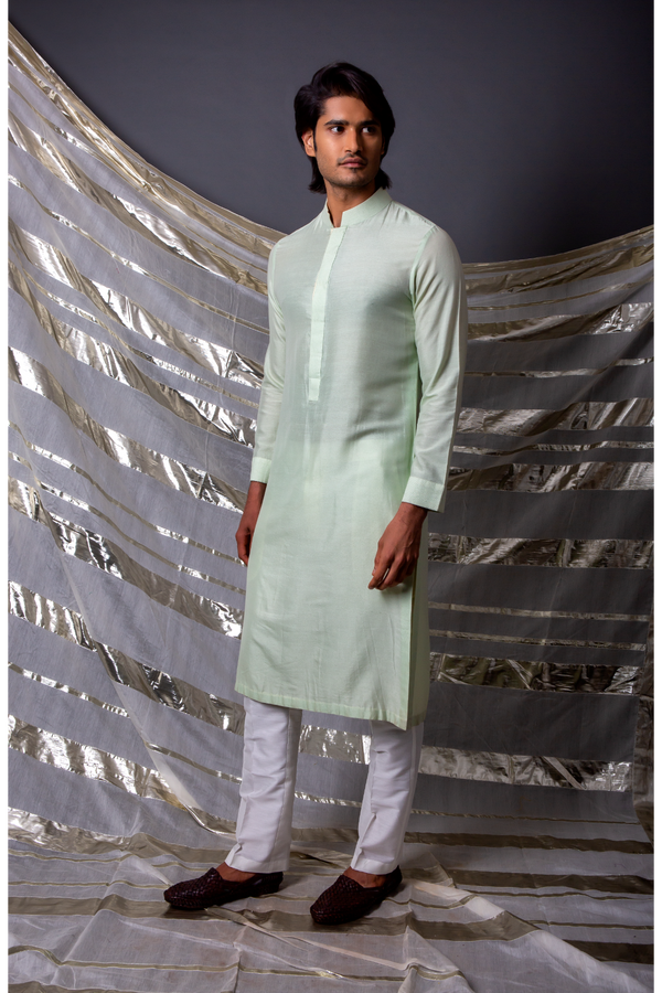 Green bandi jacket paired with long kurta and pyjama pants - Kunal Anil Tanna