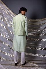 Green bandi jacket paired with long kurta and pyjama pants - Kunal Anil Tanna