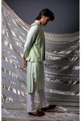 Green bandi jacket paired with long kurta and pyjama pants - Kunal Anil Tanna