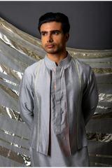 Grey bandi jacket paired with long kurta and pyjama pants - Kunal Anil Tanna