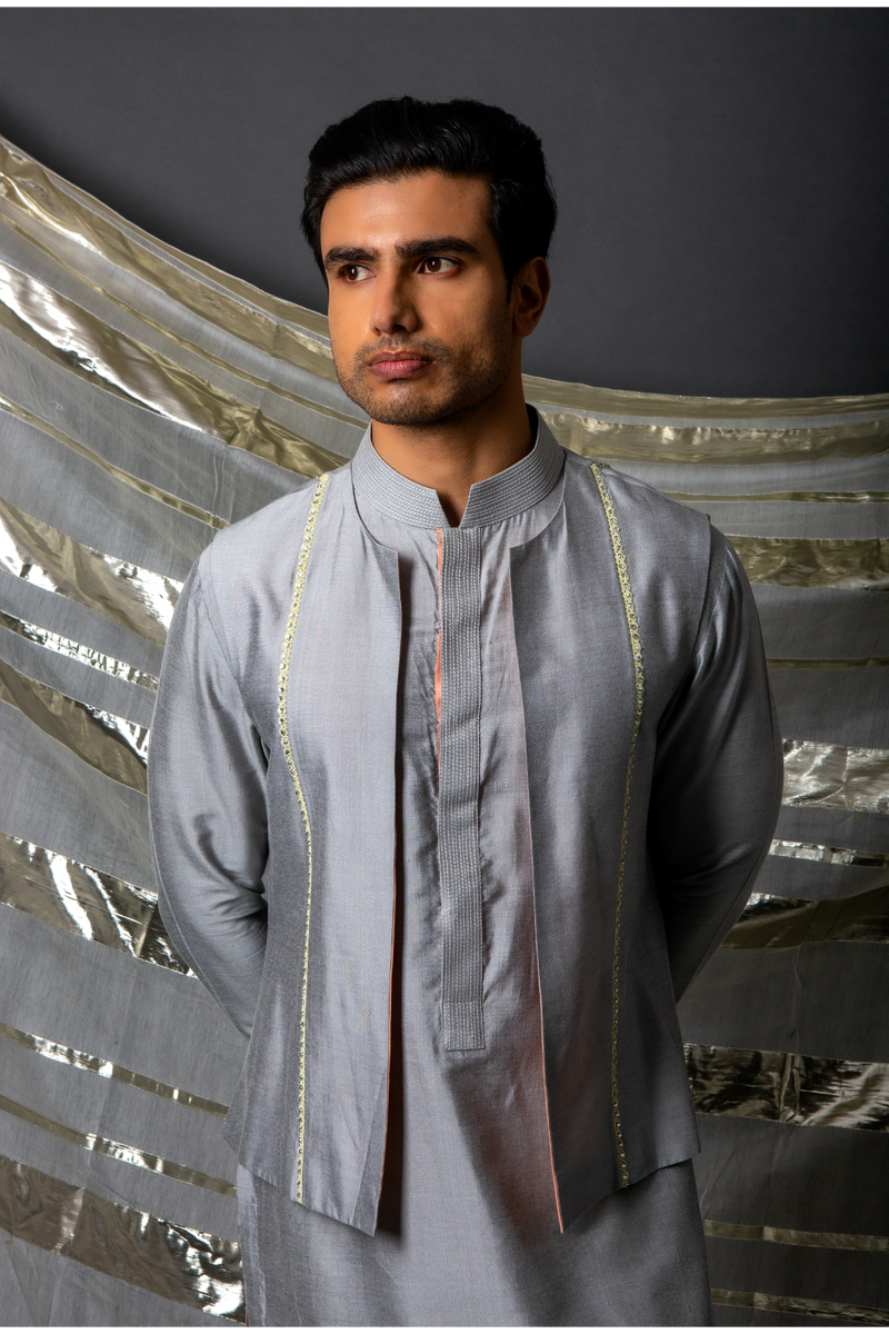 Grey bandi jacket paired with long kurta and pyjama pants - Kunal Anil Tanna