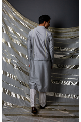 Grey bandi jacket paired with long kurta and pyjama pants - Kunal Anil Tanna