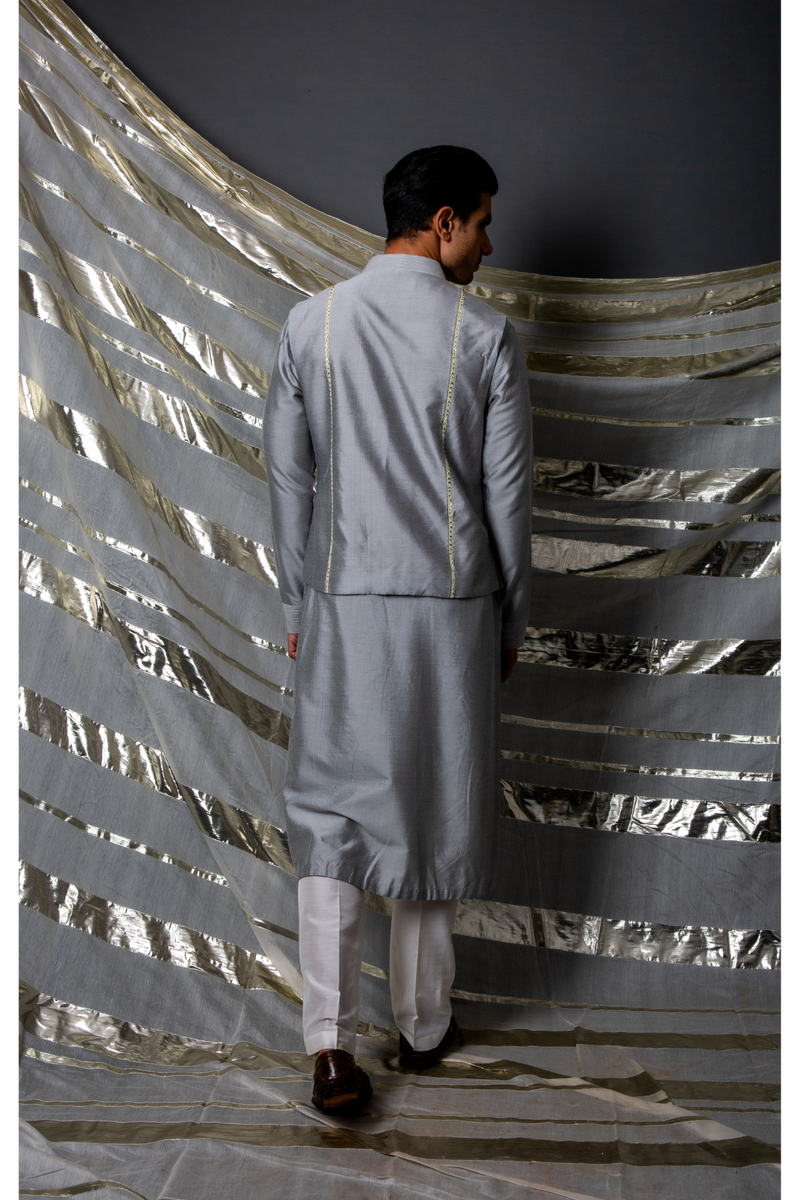 Grey bandi jacket paired with long kurta and pyjama pants - Kunal Anil Tanna