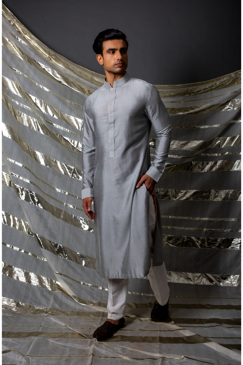 Grey bandi jacket paired with long kurta and pyjama pants - Kunal Anil Tanna