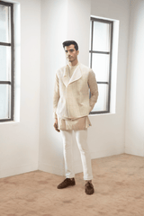 Ivory textured jacket with  off white kurta and white pants. - Kunal Anil Tanna