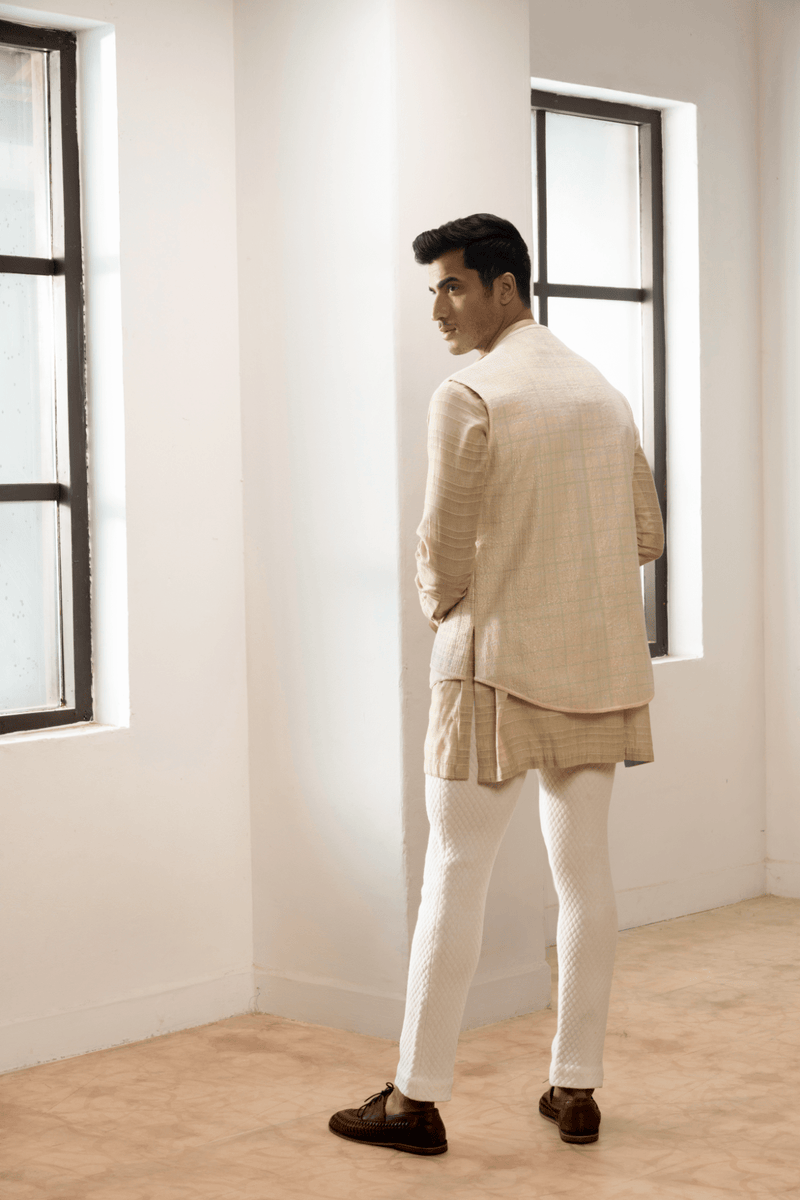 Ivory textured jacket with  off white kurta and white pants. - Kunal Anil Tanna