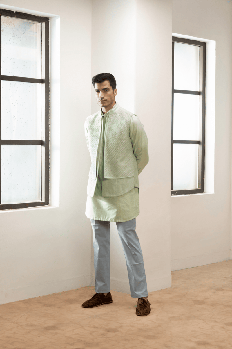 Green textured double layer jacket worn with kurta and blue trousers - Kunal Anil Tanna