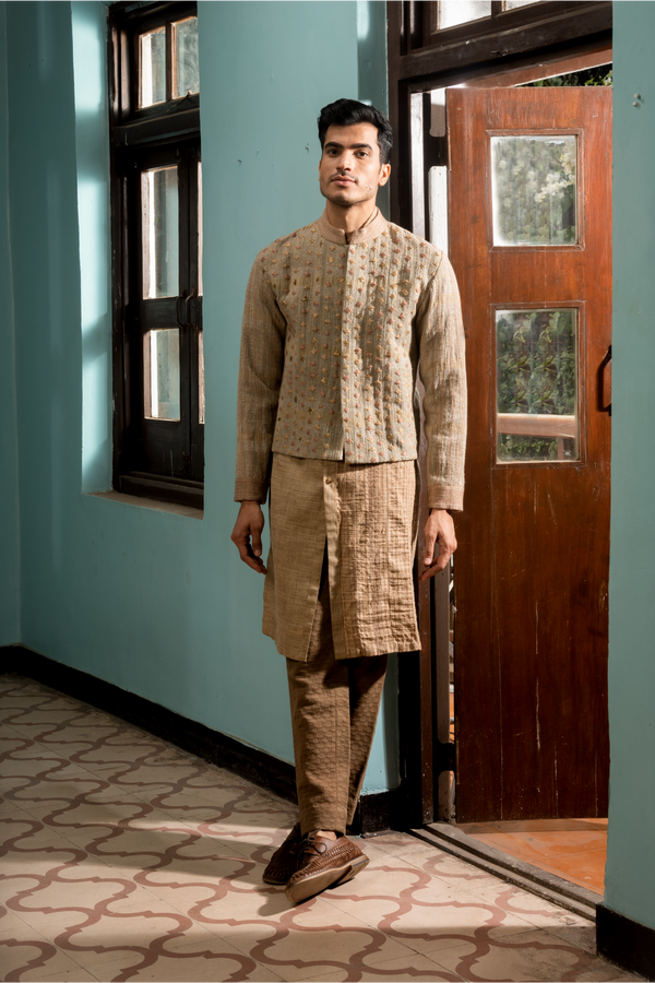 Grey textured bandhgala with beige long shirt kurta and beige trousers - Kunal Anil Tanna