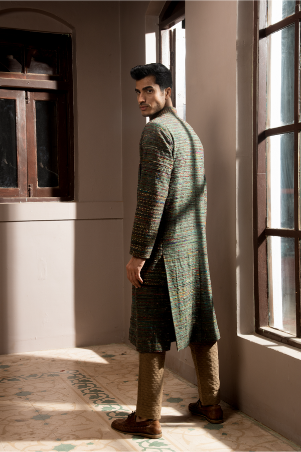 Dark green textured achkan with pleated trousers - Kunal Anil Tanna