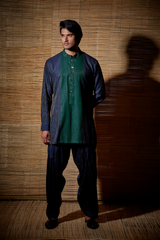 Dark blue textured kurta with dark green detail paired with salwar - Kunal Anil Tanna