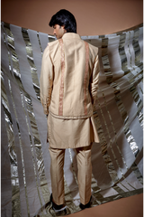 Beige zari textured bandi jacket with peach detail paired with kurta and pyjama pants - Kunal Anil Tanna
