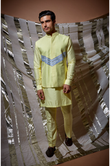 Yellow zari textured bandi jacket with blue detail paired with yellow kurta and pyjama pants - Kunal Anil Tanna