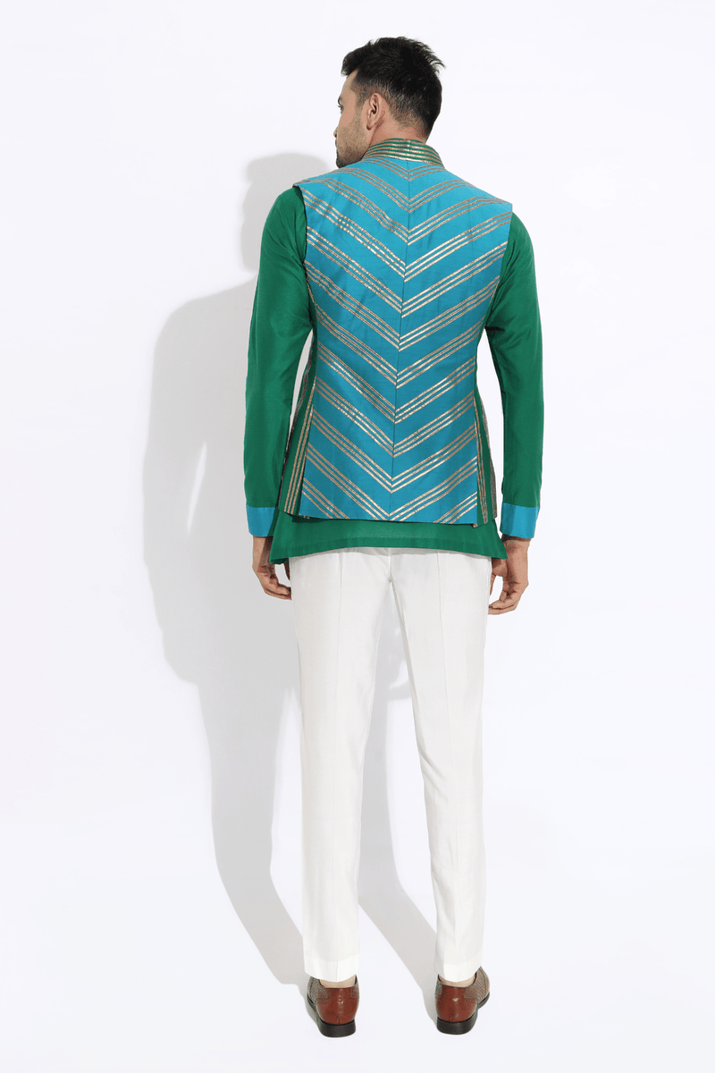 Dark green bandi with kurta and off-white aligarhi - Kunal Anil Tanna